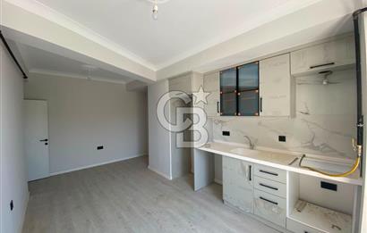 Gömeç Atatürk Caddesi Üzerinde Satılık 1+1 Asansörlü Daire