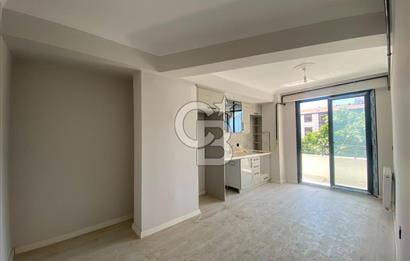 Gömeç Atatürk Caddesi Üzerinde Satılık 1+1 Asansörlü Daire