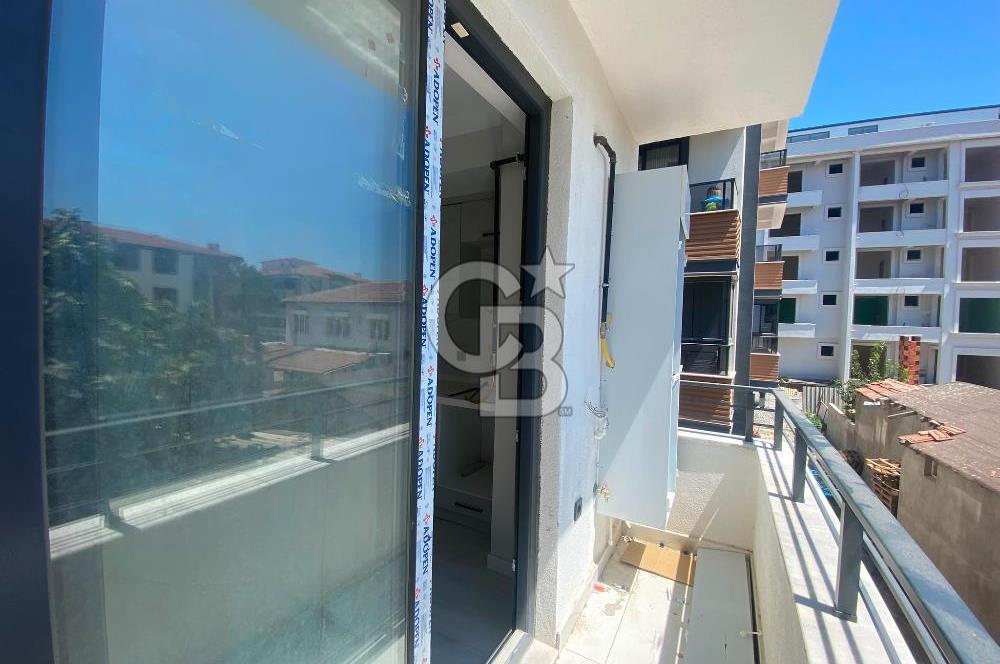 Gömeç Atatürk Caddesi Üzerinde Satılık 1+1 Asansörlü Daire