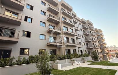 Gaziemir Aktepe’de Satılık Havuz Manzaralı Bahçeli 2+1 Daire