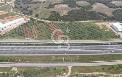 KEMALPAŞA SÜTÇÜLER'DE OTOYOLA CEPHELİ 12387 M2 SATILIK ARAZİ
