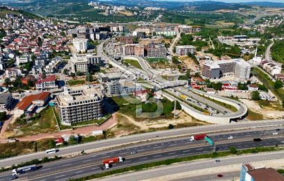CB AKADEMİ KANDIRA YOLUNA CEPHE SATILIK REZİDANS ARSA HİSSESİ