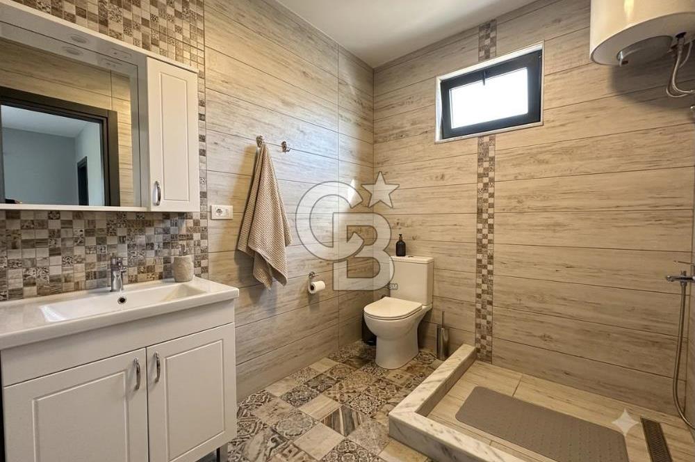 Cunda'da Ruhsatlı Taş Evli Satılık 3.120 m² Zeytinlik