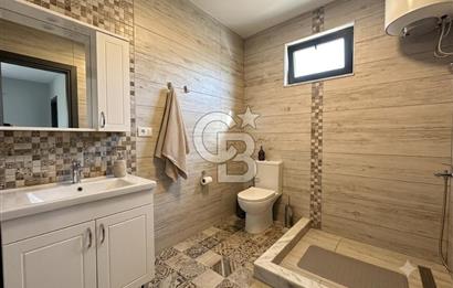 Cunda'da Ruhsatlı Taş Evli Satılık 3.120 m² Zeytinlik