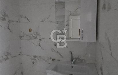 Hacıoğlu Bahçelievler Sitesi'nde Ferah ve Masrafsız 2+1 Daire
