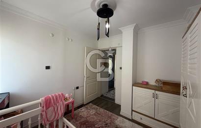 BAYRAKLI'DA SAHİLE VE İZBANA YÜRÜME MESAFELİ SATILIK 2+1 DAİRE