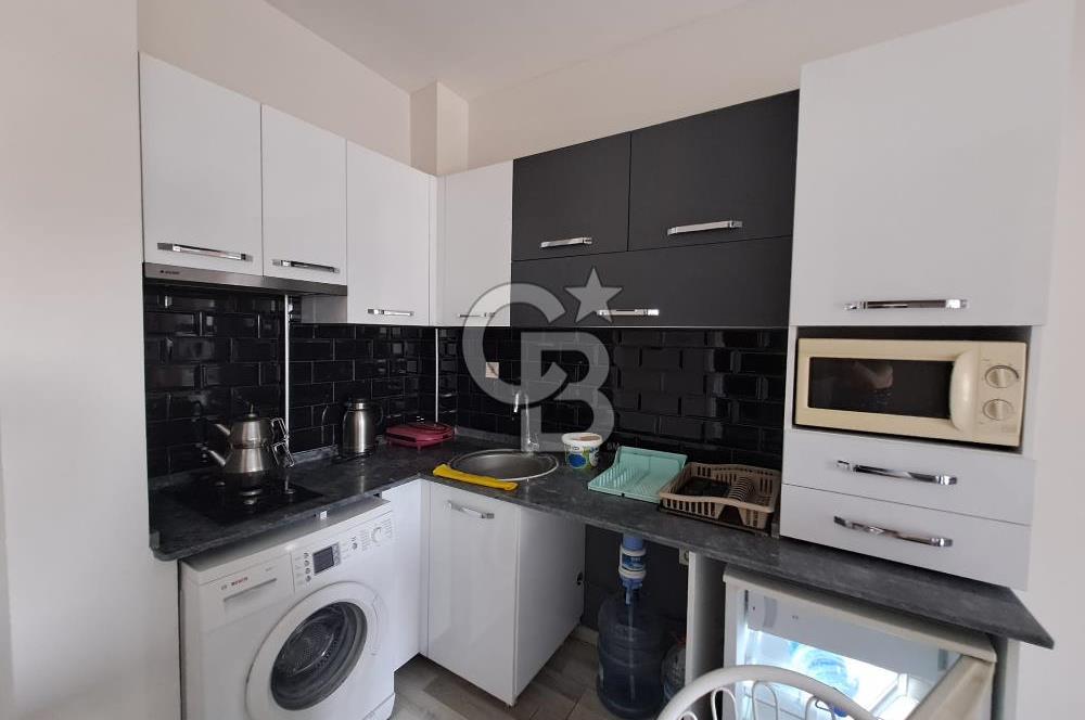 Seyrek'te Havuzlu ve Yeşillikli Site Eşyalı Kiralık 1+1