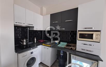 Seyrek'te Havuzlu ve Yeşillikli Site Eşyalı Kiralık 1+1