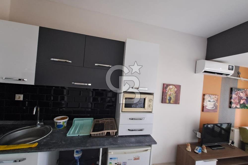 Seyrek'te Havuzlu ve Yeşillikli Site Eşyalı Kiralık 1+1