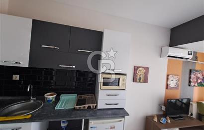 Seyrek'te Havuzlu ve Yeşillikli Site Eşyalı Kiralık 1+1