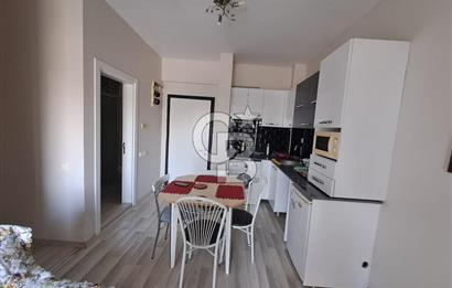 Seyrek'te Havuzlu ve Yeşillikli Site Eşyalı Kiralık 1+1