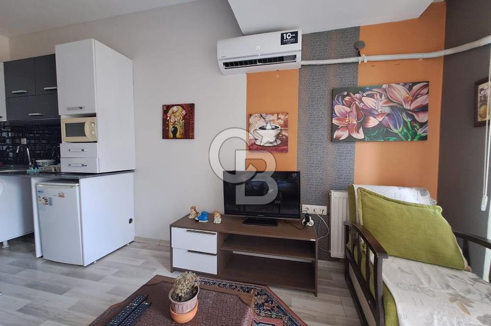 Seyrek'te Havuzlu ve Yeşillikli Site Eşyalı Kiralık 1+1