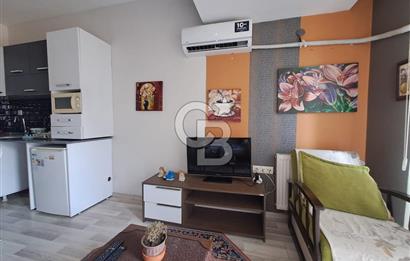 Seyrek'te Havuzlu ve Yeşillikli Site Eşyalı Kiralık 1+1
