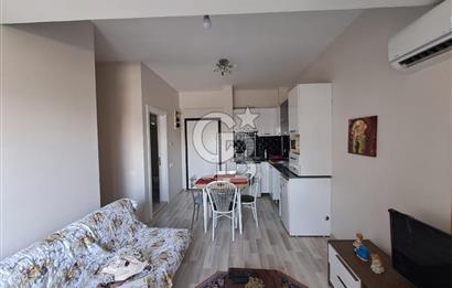 Seyrek'te Havuzlu ve Yeşillikli Site Eşyalı Kiralık 1+1