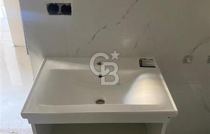 ÇİĞLİ ATAŞEHİR'DE SIFIR BİNADA SATILIK 2+1 BAHÇE KATI DAİRE