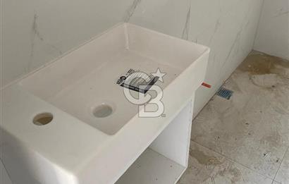 ÇİĞLİ ATAŞEHİR'DE SIFIR BİNADA SATILIK 2+1 BAHÇE KATI DAİRE