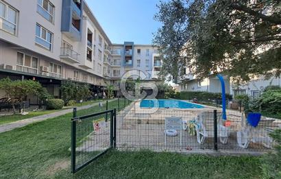 Seyrek'te Havuzlu ve Yeşillikli Site Eşyalı Kiralık 1+1