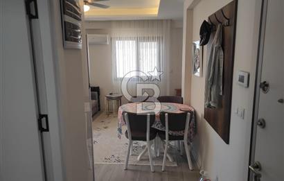 DİKİLİ ÇANDARLI MERKEZDE 1+1 EŞYALI BAHÇELİ SATILIK DAİRE