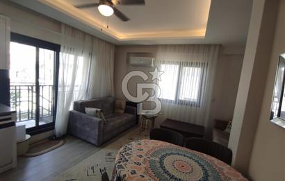 DİKİLİ ÇANDARLI MERKEZDE 1+1 EŞYALI BAHÇELİ SATILIK DAİRE