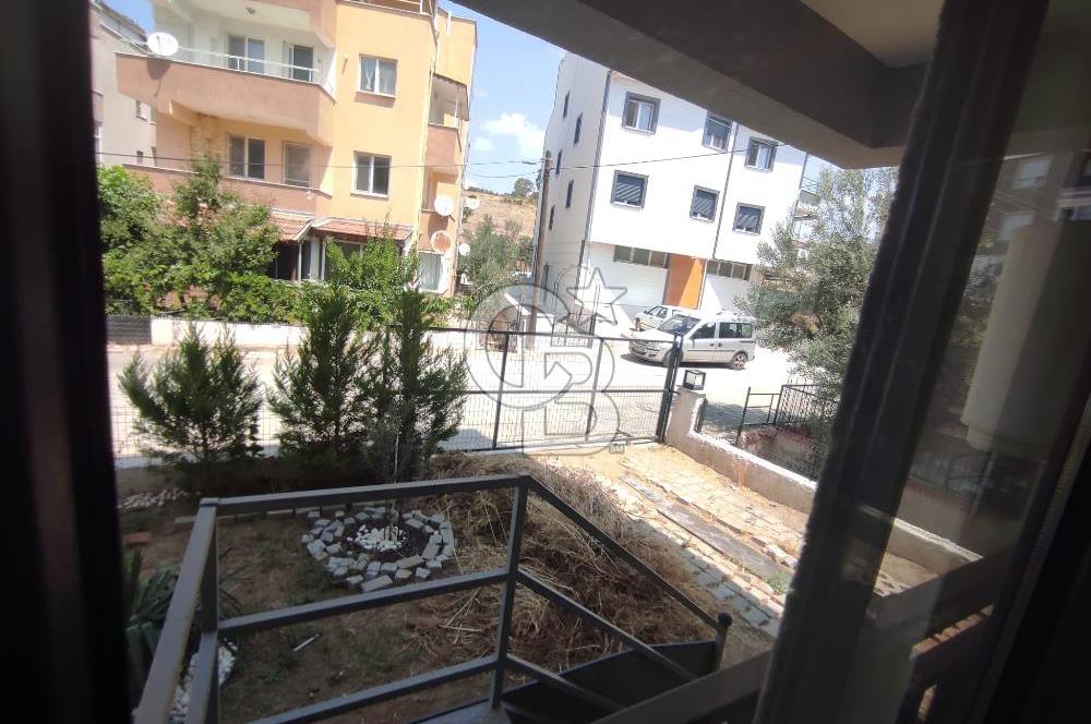 DİKİLİ ÇANDARLI MERKEZDE 1+1 EŞYALI BAHÇELİ SATILIK DAİRE