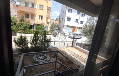 DİKİLİ ÇANDARLI MERKEZDE 1+1 EŞYALI BAHÇELİ SATILIK DAİRE