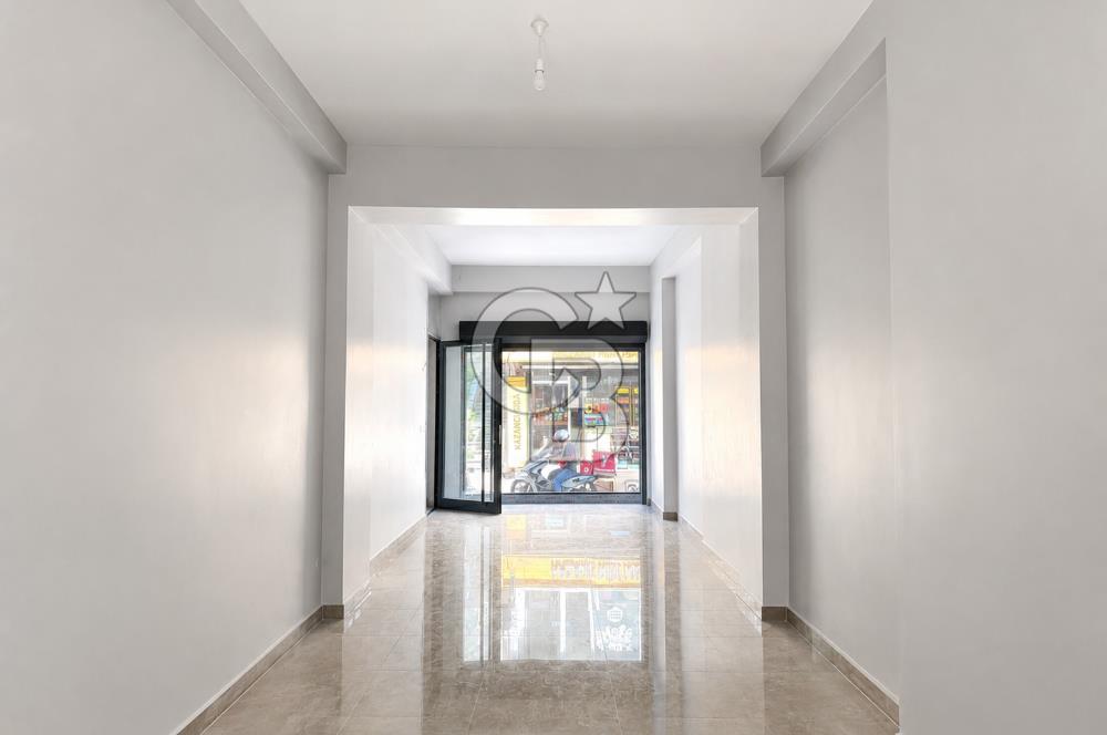 Kazancı'da Yeni Binada Yüksek Tavanlı İki Katlı Kiralık Dükkan