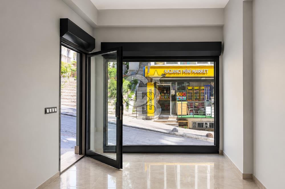 Kazancı'da Yeni Binada Yüksek Tavanlı İki Katlı Kiralık Dükkan