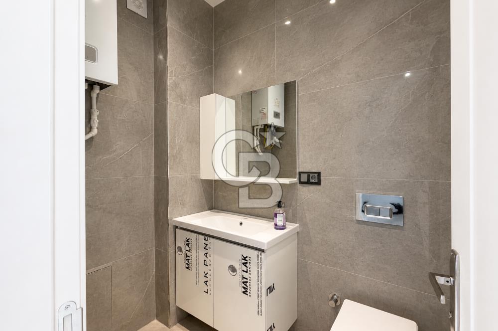 Kazancı'da Yeni Binada Yüksek Tavanlı İki Katlı Kiralık Dükkan