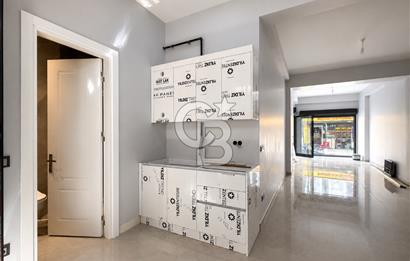 Kazancı'da Yeni Binada Yüksek Tavanlı İki Katlı Kiralık Dükkan
