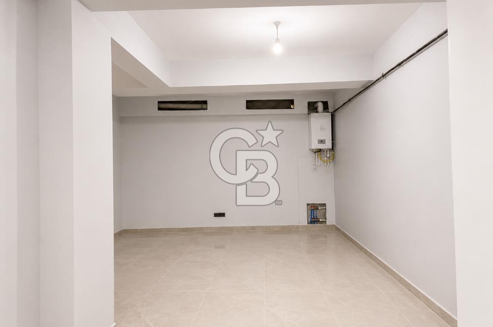 Kazancı'da Yeni Binada Yüksek Tavanlı İki Katlı Kiralık Dükkan