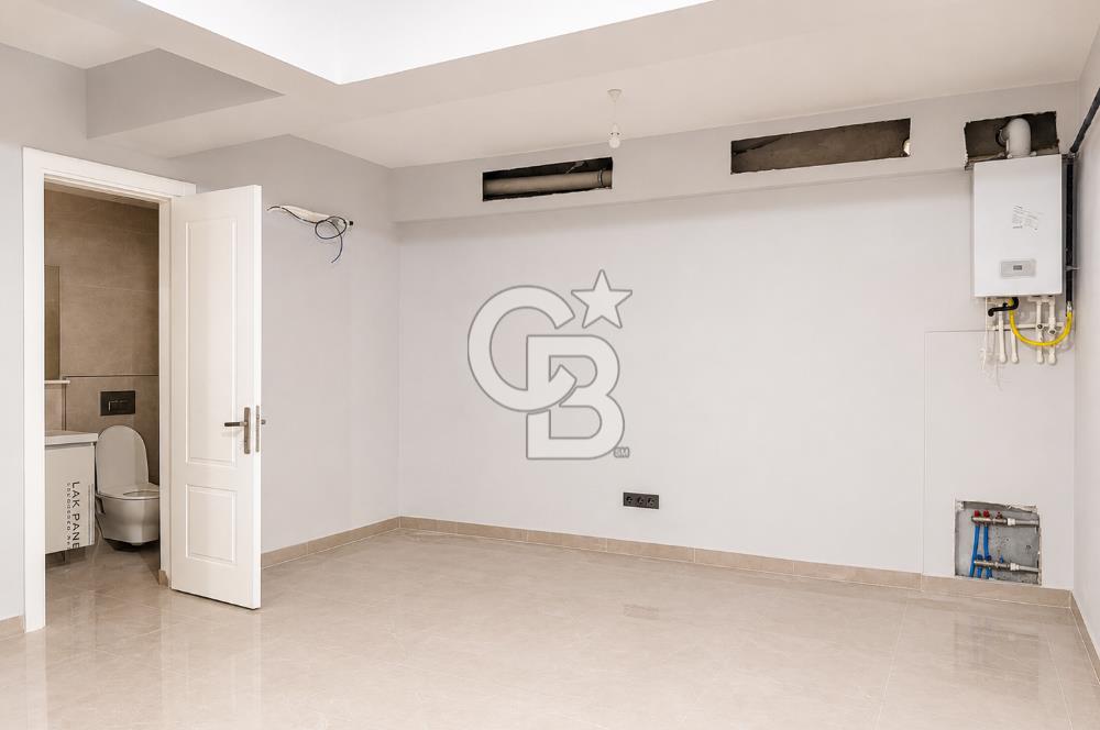 Kazancı'da Yeni Binada Yüksek Tavanlı İki Katlı Kiralık Dükkan