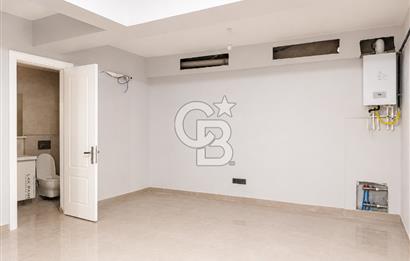 Kazancı'da Yeni Binada Yüksek Tavanlı İki Katlı Kiralık Dükkan