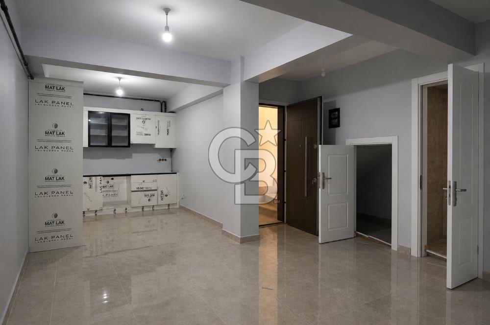 Kazancı'da Yeni Binada Yüksek Tavanlı İki Katlı Kiralık Dükkan