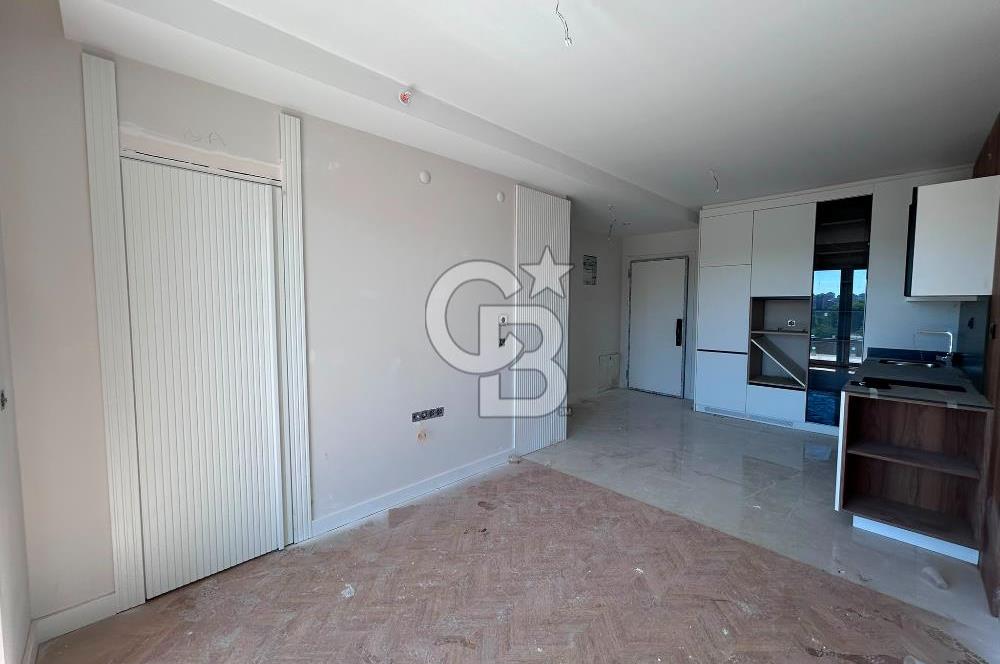 GAMADOR PARLA A BLOK'TA GÖL MANZARALI TERASLI 1+1 SATILIK DAİRE
