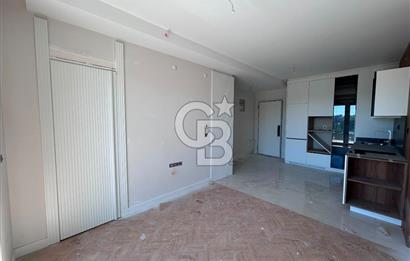 GAMADOR PARLA A BLOK'TA GÖL MANZARALI TERASLI 1+1 SATILIK DAİRE