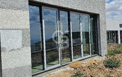 ASSOS BADEMLİ KÖYÜNDE "ASSOS MARE" SİTESİNDE SATILIK VİLLA