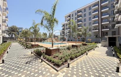 Gaziemir Aktepe’de Site İçi Havuz Cepheli 1+1 Daire