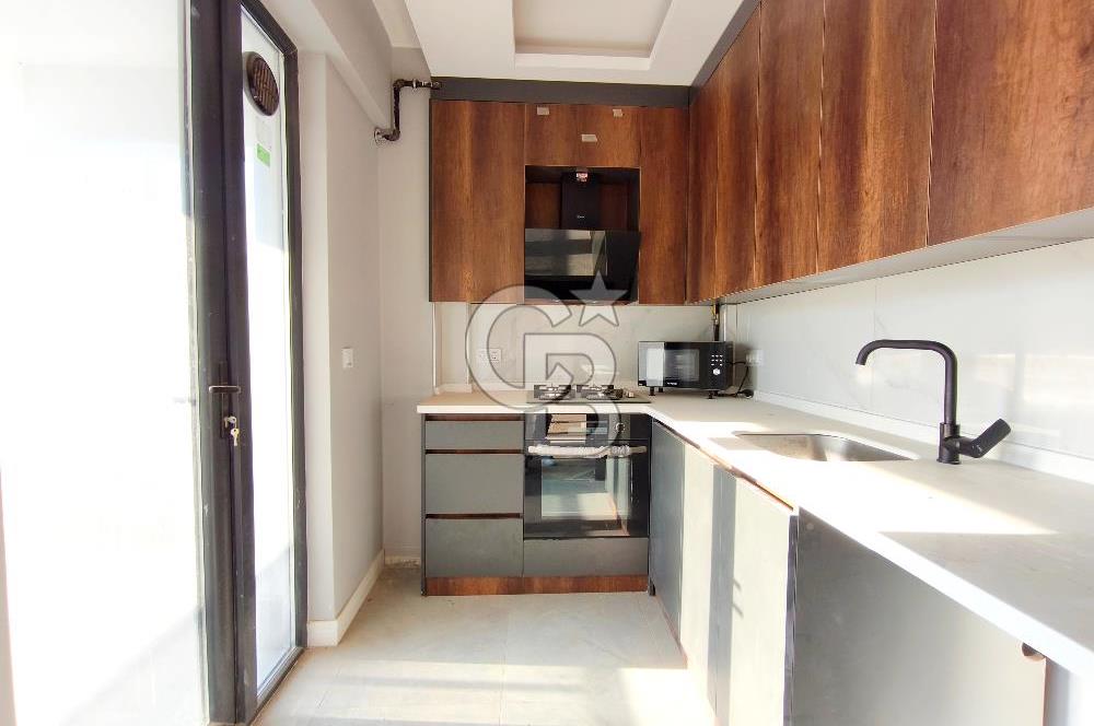  KIZILÇAŞARDA MODERN MİMARİSİYLE ÖNE ÇIKAN, SIFIR VE FERAH SATILIK DAİRE!