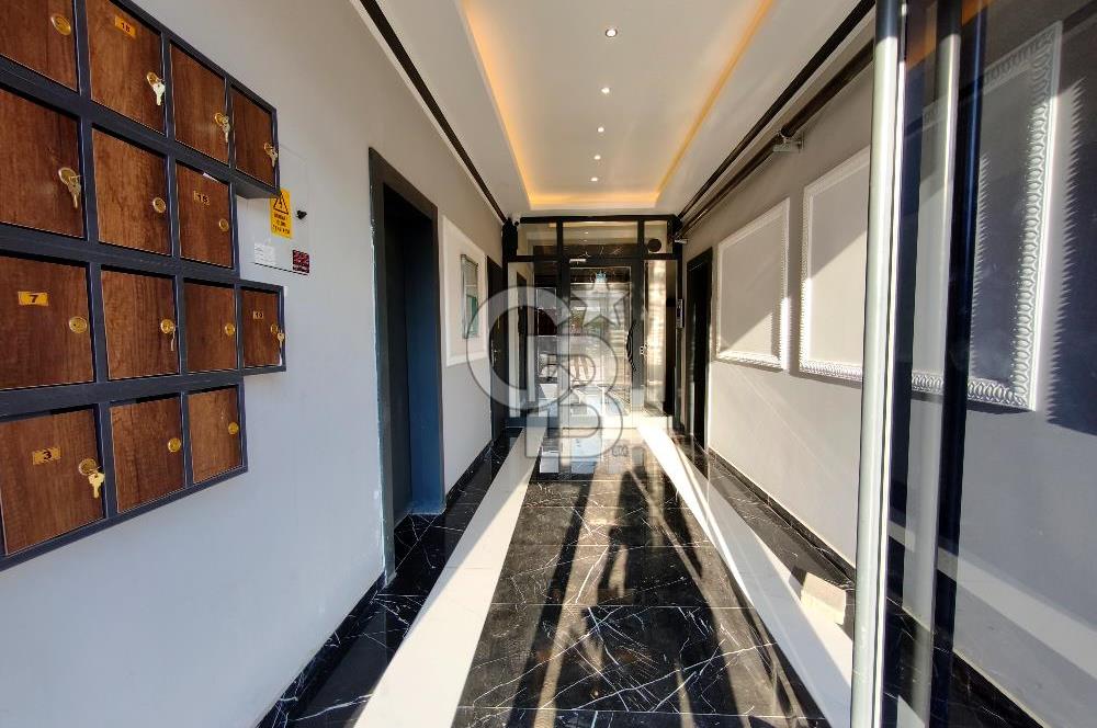  KIZILÇAŞARDA MODERN MİMARİSİYLE ÖNE ÇIKAN, SIFIR VE FERAH SATILIK DAİRE!