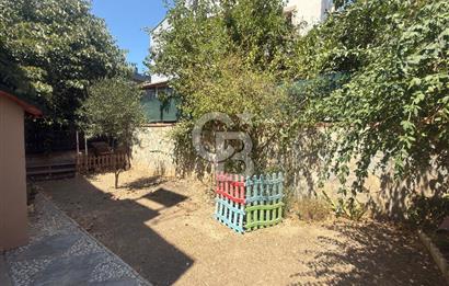 Guzelbahçe Kahramandere’de bahçeli teraslı şöminelı villa