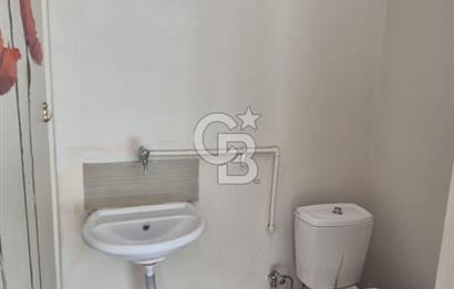 KARŞIYAKA BAHÇELİEVLER 50 M² NET + 20 M² BAHÇE | 30.000 TL KİRA GETİRİLİ DÜKKÂN”