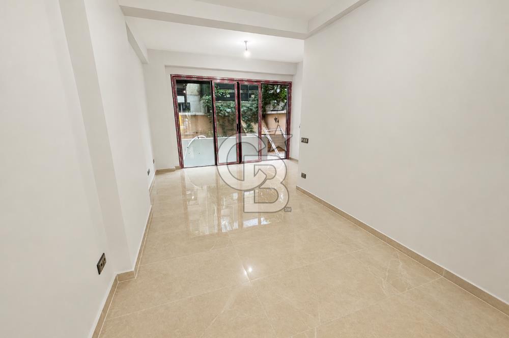 Kazancı'da Yeni Binada İki Katlı Yüksek Tavanlı Kiralık Dükkan