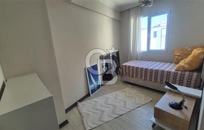 BUCA KURUÇEŞME DOĞUŞ CADDESİNDE EŞYALI BALKONLU ARAKAT SATILIK 2+1 DAİRE