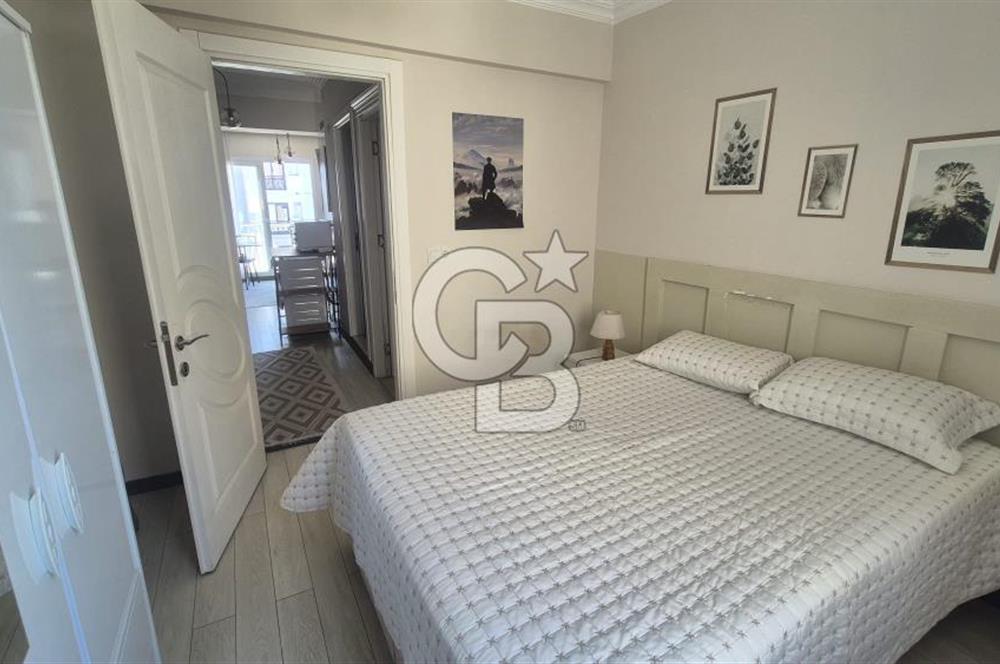 BUCA KURUÇEŞME DOĞUŞ CADDESİNDE EŞYALI BALKONLU ARAKAT SATILIK 2+1 DAİRE
