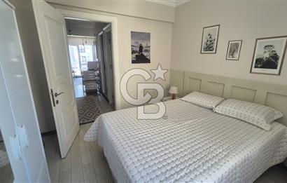BUCA KURUÇEŞME DOĞUŞ CADDESİNDE EŞYALI BALKONLU ARAKAT SATILIK 2+1 DAİRE