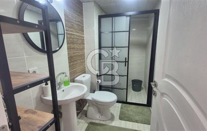 BUCA KURUÇEŞME DOĞUŞ CADDESİNDE EŞYALI BALKONLU ARAKAT SATILIK 2+1 DAİRE
