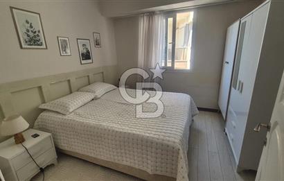 BUCA KURUÇEŞME DOĞUŞ CADDESİNDE EŞYALI BALKONLU ARAKAT SATILIK 2+1 DAİRE