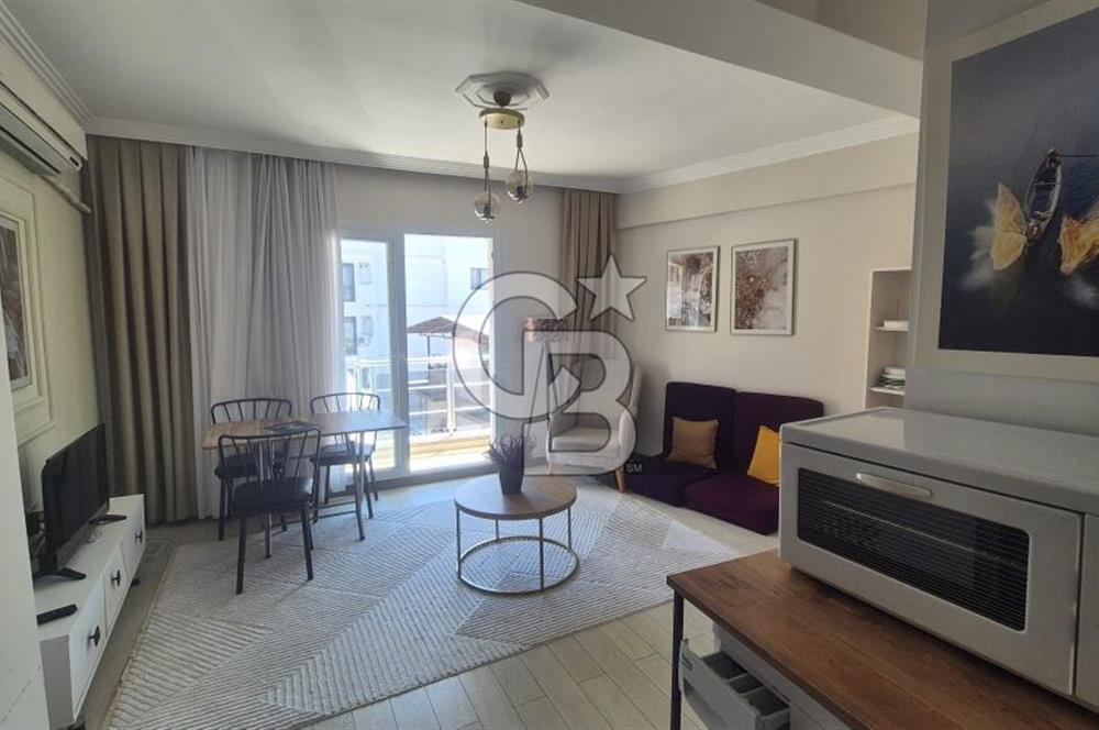 BUCA KURUÇEŞME DOĞUŞ CADDESİNDE EŞYALI BALKONLU ARAKAT SATILIK 2+1 DAİRE