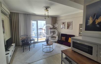 BUCA KURUÇEŞME DOĞUŞ CADDESİNDE EŞYALI BALKONLU ARAKAT SATILIK 2+1 DAİRE