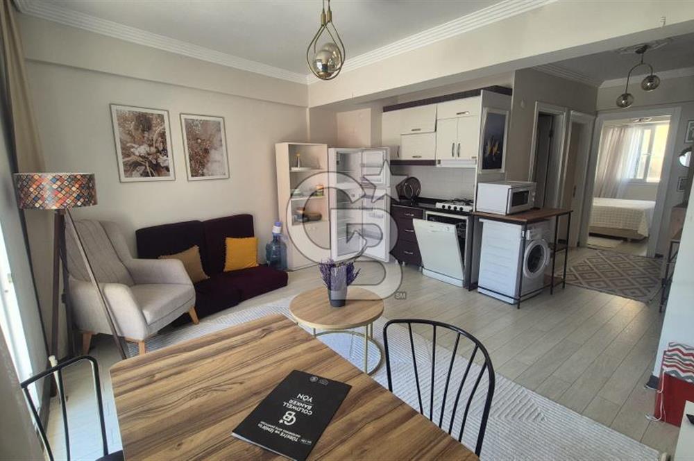 BUCA KURUÇEŞME DOĞUŞ CADDESİNDE EŞYALI BALKONLU ARAKAT SATILIK 2+1 DAİRE